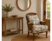 Fauteuil en rotin style vintage avec coussins fleuris | VINTO